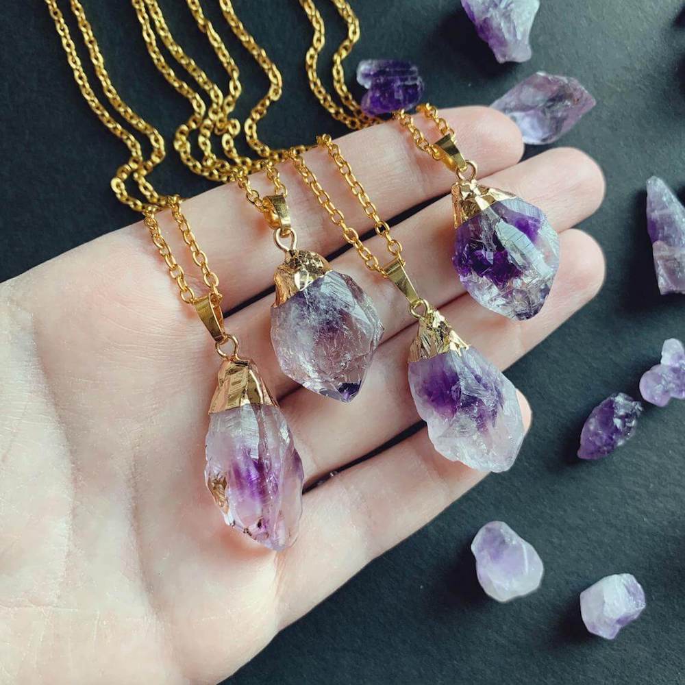 Shop for beautiful Natural Raw Amethyst Dangling Earrings, Gold Dipped with Matching Pendant. Excellent choice for women. available with FREE SHIPPING and in gold. Find a Gold Amethyst Necklace or Gold Amethyst Necklace when you shop at Magic Crystals. February birthstone.