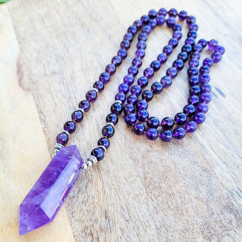 Shop beautiful hand crafted Amethyst Mala Necklace. High quality Prayer Beads Necklace at Magic Crystals. Magiccrystals.com Inspiring People To Practice Yoga and Meditation. Check out our Mala Necklaces Collection. Mala beads are a string of beads that are used in a meditation practice.
