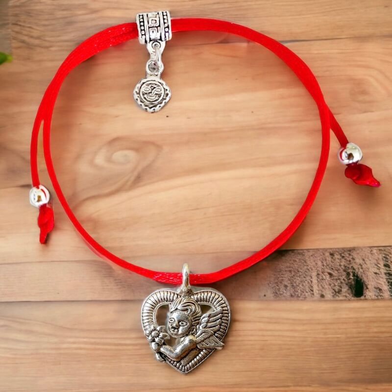 Angel-Red-String-Bracelet. Shop at Magic Crystals for Protection. The Red String Bracelet has been worn throughout history in many cultures as a symbol of protection, faith, and good luck and acts as a shield from negativity and actually has many positive effects. In quite a few cultures a red string bracelet is believed to have magical powers.