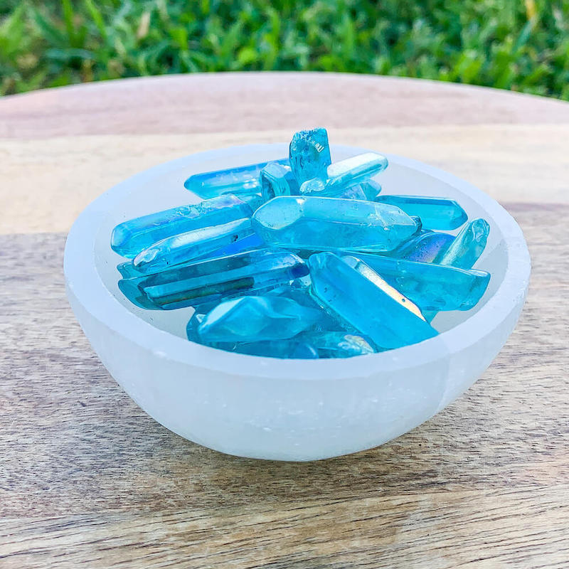 Looking for Aqua Aura Points, Blue Quartz Point? Shop at Magic Crystals for a variety of Aura Quartz Crystal Blue Jewelry. Aura Quartz Crystal point perfect for healing. Raw Blue Aura Quartz Crystal Necklace, Healing Gemston