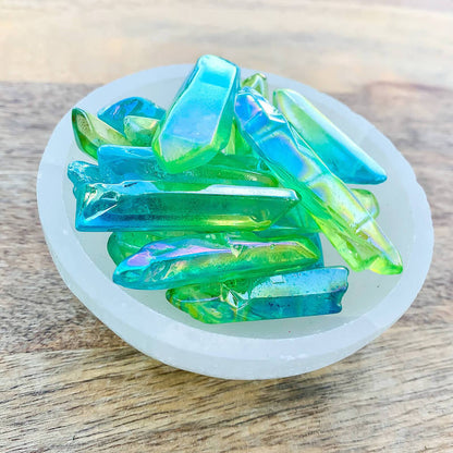 Looking for Blue Aqua Aura & Sunshine Aura Quartz Points? Shop at Magic Crystals for Aqua Aura Quartz Crystal Point and Sunshine Aura quartz points between (~1" - 2") size. Raw Aqua Aura Quartz Point - Aqua Aura Quartz Stone - Blue Quartz. Healing Crystals & Stones that can be used at jewelry, DIY crystals, and more