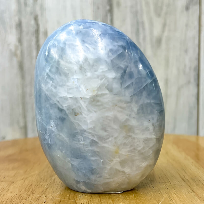 Looking for a Blue Calcite Polished Freeform? Shop at Magiccrystals for Blue Calcite Polished Freeforms, different sizes available including Large Free Standing Cut Base, Specimens, these Healing Crystals are helpful for Throat Chakra, Calcite Specimen. Choose Size ('AAA' Grade, Cut Base Blue Calcite Free Form. Blue-Calcite-Freeform-E