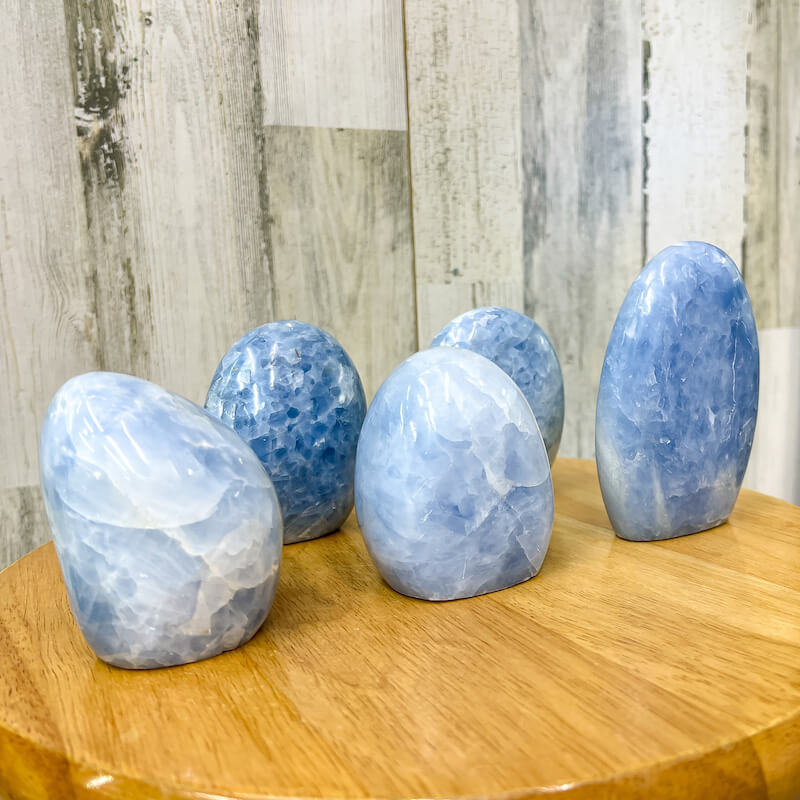 Looking for a Blue Calcite Polished Freeform? Shop at Magiccrystals for Blue Calcite Polished Freeforms, different sizes available including Large Free Standing Cut Base, Specimens, these Healing Crystals are helpful for Throat Chakra, Calcite Specimen. Choose Size ('AAA' Grade, Cut Base Blue Calcite Free Form. Blue-Calcite-Freeform