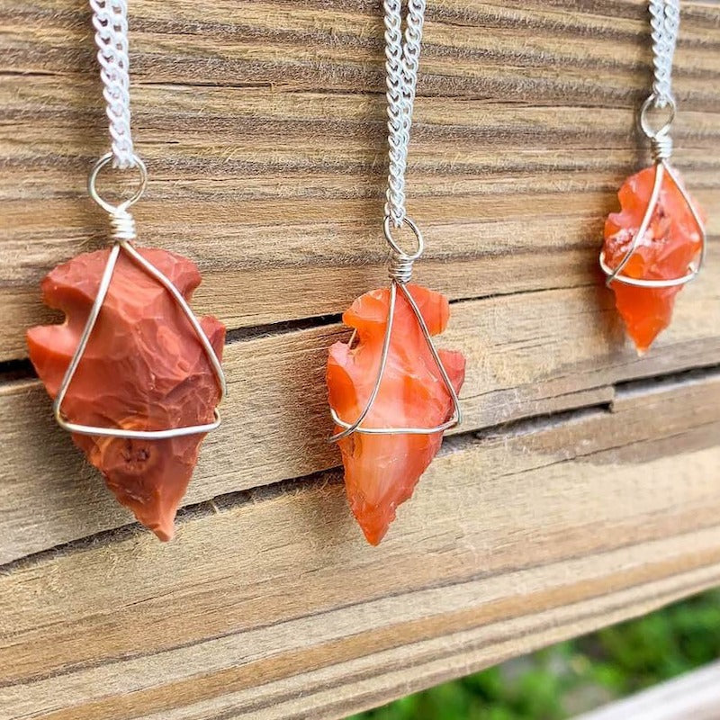 Buy Orange raw Arrowhead Carnelian Necklace - Carnelian Gemstone, Natural Carnelian Gemstone orange Gemstone Points at Magic Crystals. Shop for carnelian jewelry with FREE SHIPPING. Carnelian is best for Motivation. polished Carnelian red and orange necklace. Carnelian Arrowhead Pendant Necklace, Carnelian Jewelry.