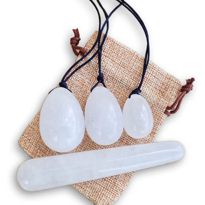 Clear-Quartz-Yoni Eggs Set and Massage Wand. These Natural Stone Yoni Egg Set and Massage Wand from Magic Crystals help you build an intimate connection with your body. Polished yoni egg crystals and wand are drilled available in Black Onyx,  Opalite, Unakite, Nephrite Jade, tiger Eye, Clear Quartz, Red jasper, Aventurine, Amethyst, Rose Quartz