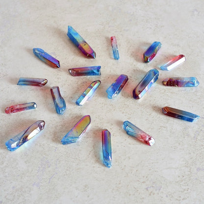 Deep-Blue-Aura-and-Ruby-Aura-Quartz-Points. Aura Quartz Crystal Polished Point Wand