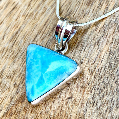 This lovely, rare and spectacular mineral gem called Larimar is a blue pectolite found in the Dominican Republic. Shop Genuine Natural Larimar Necklace, Dominican Larimar Jewelry at Magic Crystals. Sterling Caribbean Larimar Necklace, Gift For Her, Gemstone Pendant. Magiccrystals.com carries the essence of the ocean.
