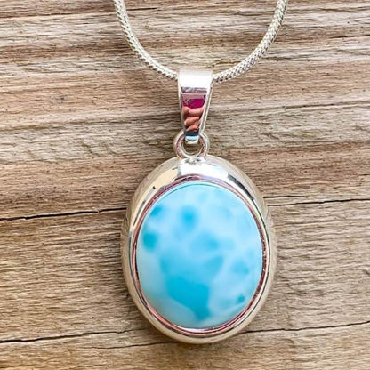 This lovely, rare and spectacular mineral gem called Larimar is only found in the Dominican Republic. Shop Genuine Natural Larimar Necklace, Dominican Ambar and Larimar Jewelry at Magic Crystals. Sterling Caribbean Larimar Necklace, Gift For Her, Gemstone Pendant. Magiccrystals.com carries the essence of the ocean.