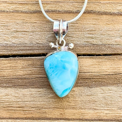This lovely, rare and spectacular mineral gem called Larimar is only found in the Dominican Republic. Shop Genuine Natural Larimar Necklace, Dominican Ambar and Larimar Jewelry at Magic Crystals. Sterling Caribbean Larimar Necklace, Gift For Her, Gemstone Pendant. Magiccrystals.com carries the essence of the ocean.