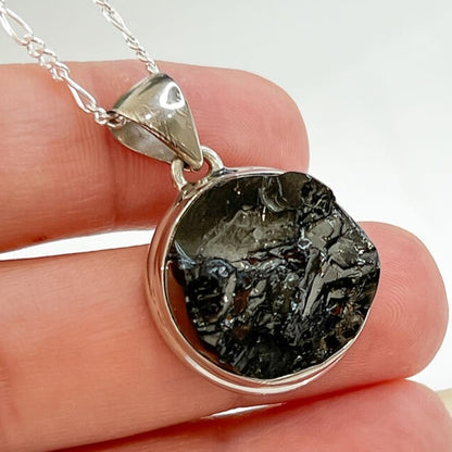 Elite-Shungite-Sterling-Silver-Necklace-O. Shop for Elite Silver Noble Raw Shungite 925 Sterling Silver Bail Pendant Necklace. Noble Shungite Necklace. Sterling Silver Shungite Necklace at magic crystals. Genuine Shungite stones. Chakra Stones, Spiritual Stone. Chakra Healing Stone. free shipping available. Block EMF's WIFI Radiation 5G.