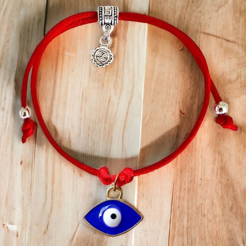 -Evil-Eye-Red-String-Bracelet. Shop at Magic Crystals for Protection. The Red String Bracelet has been worn throughout history in many cultures as a symbol of protection, faith, and good luck and acts as a shield from negativity and actually has many positive effects. In quite a few cultures a red string bracelet is believed to have magical powers.