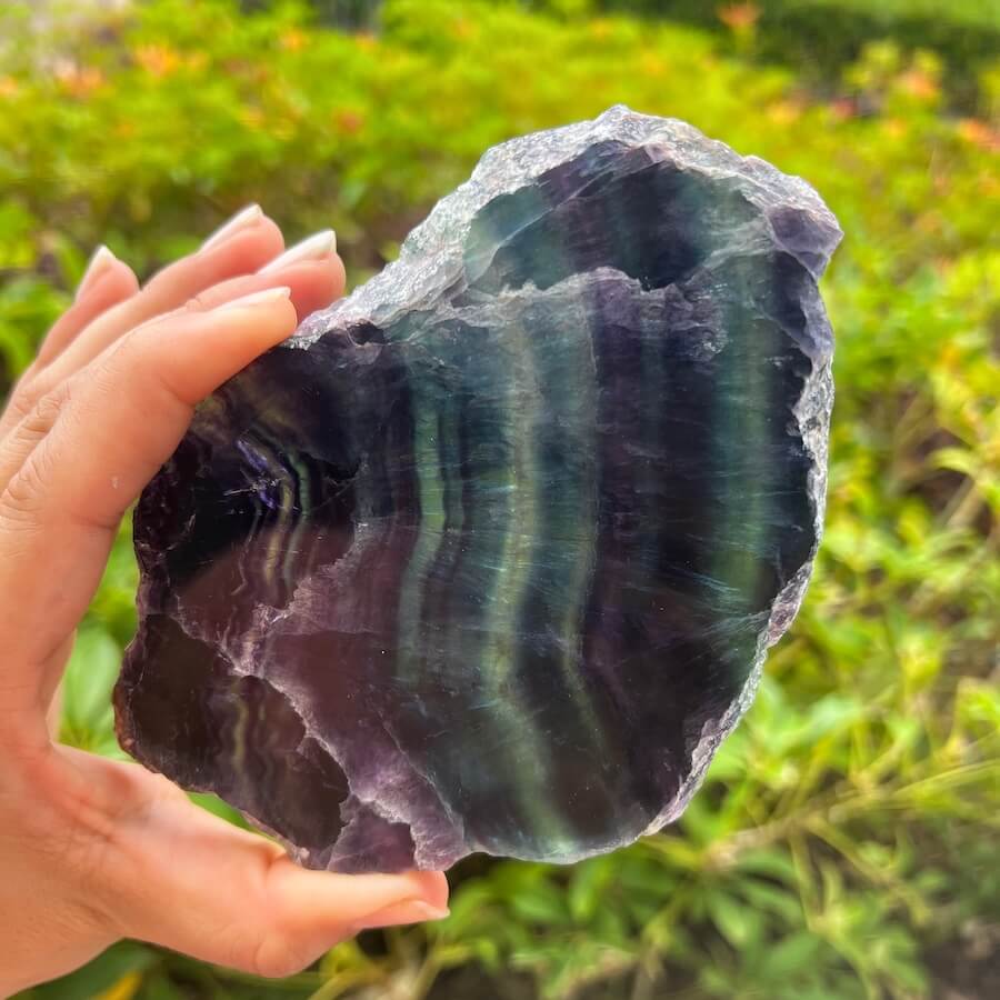 Quality Rainbow Fluorite Slab, Polished Fluorite Crystal, Natural Home Decor from MagicCrystals.com ships from Miami, FL since 2018. Polished fluorite crystal features beautiful bands of natural coloring with lovely depth, clarity, and unique internal patterns throughout the piece. 