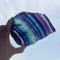 Quality Rainbow Fluorite Slab, Polished Fluorite Crystal, Natural Home Decor from MagicCrystals.com ships from Miami, FL since 2018. Polished fluorite crystal features beautiful bands of natural coloring with lovely depth, clarity, and unique internal patterns throughout the piece. 