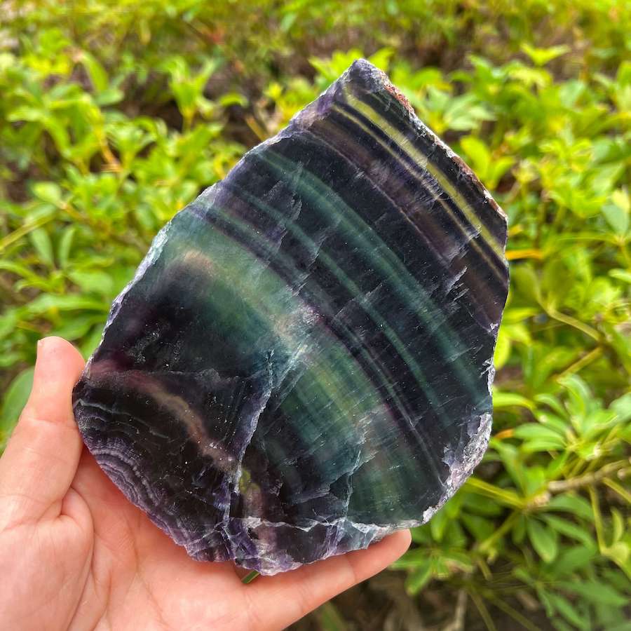 Quality Rainbow Fluorite Slab, Polished Fluorite Crystal, Natural Home Decor from MagicCrystals.com ships from Miami, FL since 2018. Polished fluorite crystal features beautiful bands of natural coloring with lovely depth, clarity, and unique internal patterns throughout the piece. 