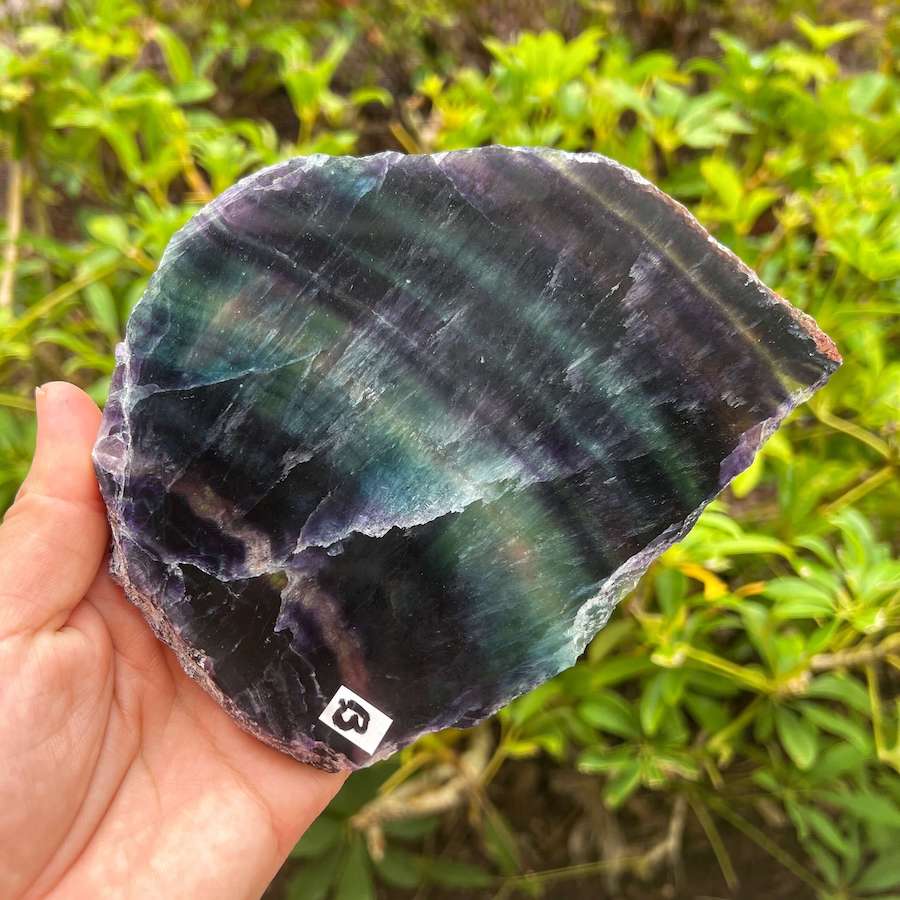 Quality Rainbow Fluorite Slab, Polished Fluorite Crystal, Natural Home Decor from MagicCrystals.com ships from Miami, FL since 2018. Polished fluorite crystal features beautiful bands of natural coloring with lovely depth, clarity, and unique internal patterns throughout the piece. 