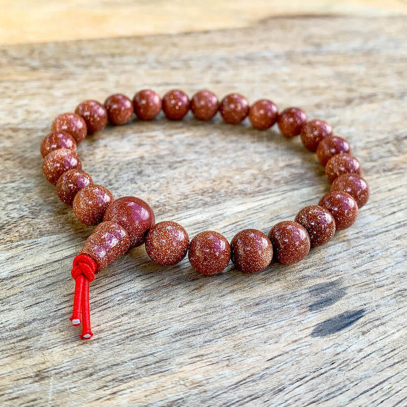 Looking for Goldstone Elastic Mala Bead Bracelet - Goldstone Jewelry? Shop at Magic Crystals for goldstone necklaces, goldstone earrings, and more. Goldstone is said to help attain one's goals. Goldstone is also said to help one stay calm and stabilize emotions. FREE SHIPPING available.