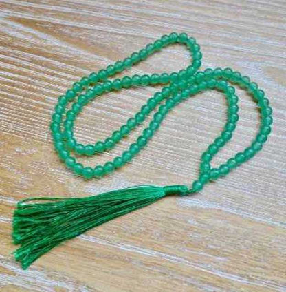 Shop beautiful hand crafted Natural Gemstone Mala Necklace - Prayer Beads at Magic Crystals. High quality Prayer Beads, Including Lapis Lazuli, Larvikite, Snowflake Obsidian, Howlite, Black Agate, Picture Jasper, Red Jasper, and Amethyst. Handcrafted with 108 beads, can be worn as a necklace or bracelet.