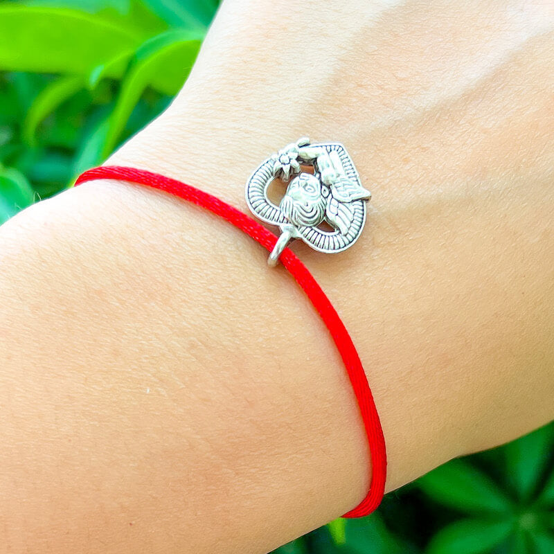 Guardian-Angel-Red-String-Bracelet. Shop at Magic Crystals for Protection. The Red String Bracelet has been worn throughout history in many cultures as a symbol of protection, faith, and good luck and acts as a shield from negativity and actually has many positive effects. In quite a few cultures a red string bracelet is believed to have magical powers.