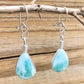 This lovely, rare and spectacular mineral gem called Larimar is a blue pectolite found in the Dominican Republic. Shop Genuine Blue Larimar Earrings set in Sterling Silver at Magic Crystals. We carry Larimar Teardrop Stone, Sterling Caribbean Larimar Earrings, Gift For Her, Gemstone Earrings and Dangle earrings.