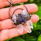     Handmade-Amethyst-and-clear-quartz-bronze-necklace. Natural handcrafted bronze necklaces, perfect accessory to spice up your wardrobe with a touch of bohemian flair. Our bronze necklace collection includes hand carved pendants made of natural Amethyst, Clear Quartz, Labradorite, Rose Quartz, Blue Kyanite and more! A true timeless fashion statement.