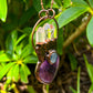 Handmade-Amethyst-clear-quartz-kyanite-bronze-necklace. Natural handcrafted bronze necklaces, perfect accessory to spice up your wardrobe with a touch of bohemian flair. Our bronze necklace collection includes hand carved pendants made of natural Amethyst, Clear Quartz, Labradorite, Rose Quartz, Blue Kyanite and more! A true timeless fashion statement.