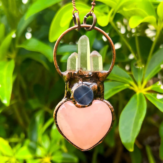 kyanite-bronze-necklace. Natural handcrafted bronze necklaces, perfect accessory to spice up your wardrobe with a touch of bohemian flair. Our bronze necklace collection includes hand carved pendants made of natural Amethyst, Clear Quartz, Labradorite, Rose Quartz, Blue Kyanite and more! A true timeless fashion statement.