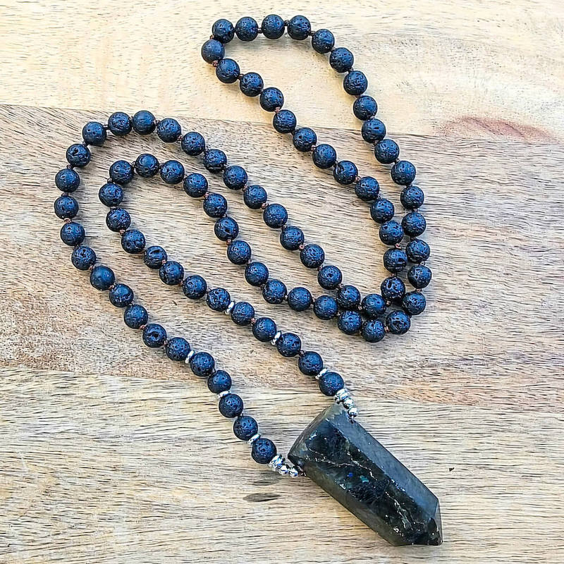 Shop Crystal Necklaces. Labradorite and Lava Mala Necklace - Handcrafted for Chakra Energy at Magic Crystals. This Mala Stone is made of Black Lava Stone. FREE SHIPPING available. Black Lava Stone is known for its grounding qualities, it’s wonderful for calming the emotions. FREE SHIPPING available.