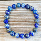 8 mm-Lapis-Lazuli-Gemstone Beaded Bracelet - MagicCrystals.Check out our Gemstone Beaded Bracelet made of polished stone - 8mm Crystal Stone bracelet. This are the very Best and Unique Handmade items from MagicCrystals.com Crystal Bracelet, Gemstone bracelet, Minimalist Crystal Jewelry, Trendy Summer Jewelry, Gift for him and her.