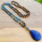 Shop beautiful hand-crafted Tiger Eye and Lapis Lazuli Stone Mala Necklace. High-quality Blue Prayer Beads at Magic Crystals. Throat Chakra Healing Necklace. Inspiring People To Practice Yoga and Meditation. Check out our Mala Necklaces Collection. Mala beads are a string of beads that are used in a meditation practice