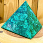 Experience the power and energy of genuine Congo malachite with this beautiful large pyramid. Handcrafted to perfection, this malachite pyramid will fill your space with energy and positivity. Unlock your spiritual potential with this one-of-a-kind malachite pyramid!