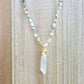 Awaken your Throat and Heart Eye Chakra with our captivating Larimar and Clear Quartz Knotted Beads Mala Necklace gemstone mala! Exclusive to Magic Crystals. Mala features a combination of Larimar and Clear Quartz beads. Each pendant and necklace is unique!