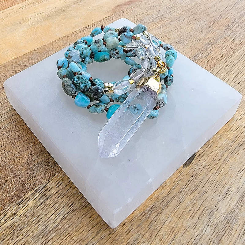 Awaken your Throat and Heart Eye Chakra with our captivating Larimar and Clear Quartz Knotted Beads Mala Necklace gemstone mala! Exclusive to Magic Crystals. Mala features a combination of Larimar and Clear Quartz beads. Each pendant and necklace is unique!