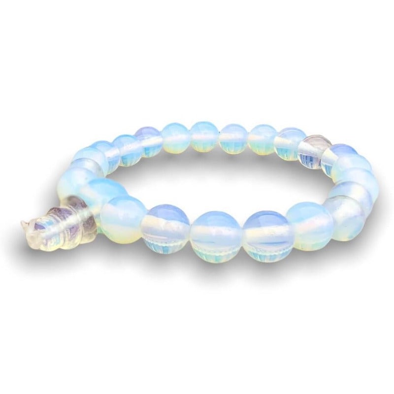 Find the best selection of Opalite Stone Mala Bracelet - Natural Bead Opal Gemstone Bracelet at Magic Crystals. Opalite meaning stabilizes mood swings and helps in overcoming fatigue. Opalite bracelet, opalite crystal bracelet. 7-8 inch bracelets crystals opalite. Opal stone bracelet. Opalite Jewelry with FREE SHIPPING