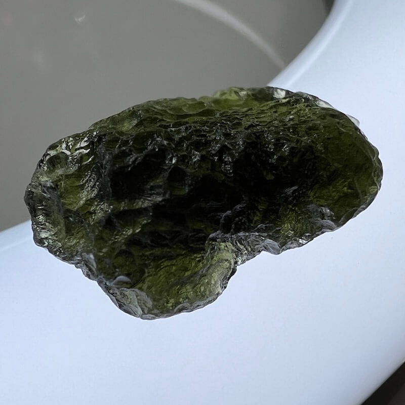 RARE Authentic Moldavite - Meteorite - Healing Crystal - Moldavite available. Looking for an genuine moldavite? Find Moldavite Meteorite tektite when you shop at Magic Crystals. 5 Grams of Authentic Moldavite stone from Czech Republic - Tektite Crystal, 'A' Grade at Magiccrystals.com. Moldavite-5-grams-A2