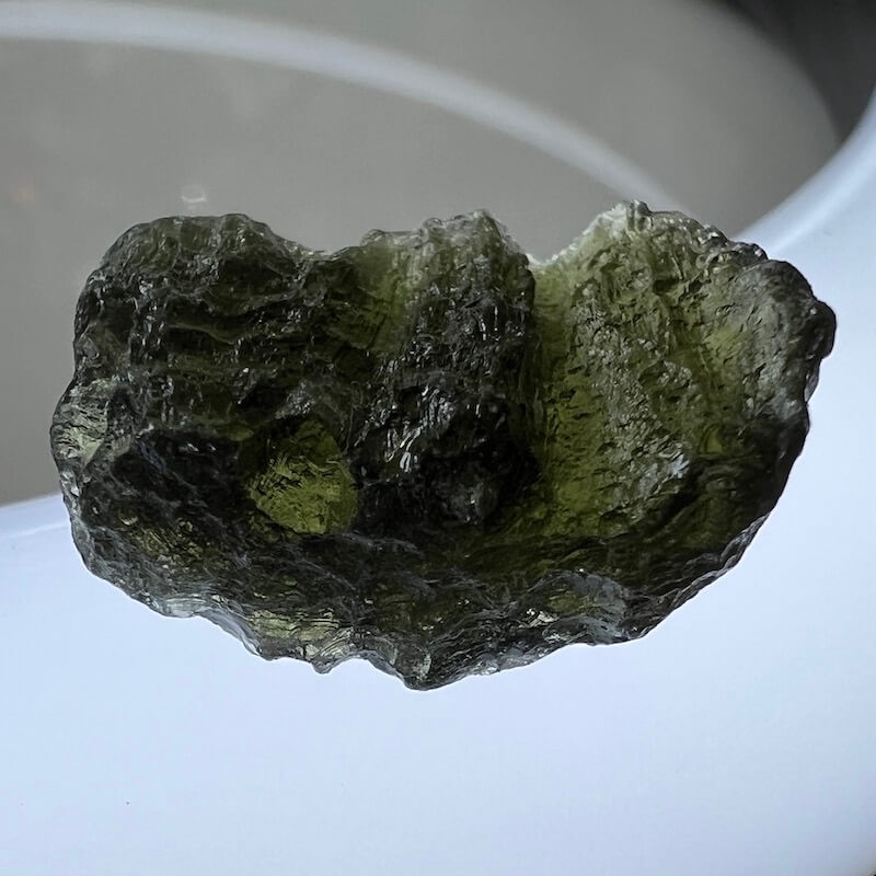 RARE Authentic Moldavite - Meteorite - Healing Crystal - Moldavite available. Looking for an genuine moldavite? Find Moldavite Meteorite tektite when you shop at Magic Crystals. 5 Grams of Authentic Moldavite stone from Czech Republic - Tektite Crystal, 'A' Grade at Magiccrystals.com. Moldavite-5-grams-A3