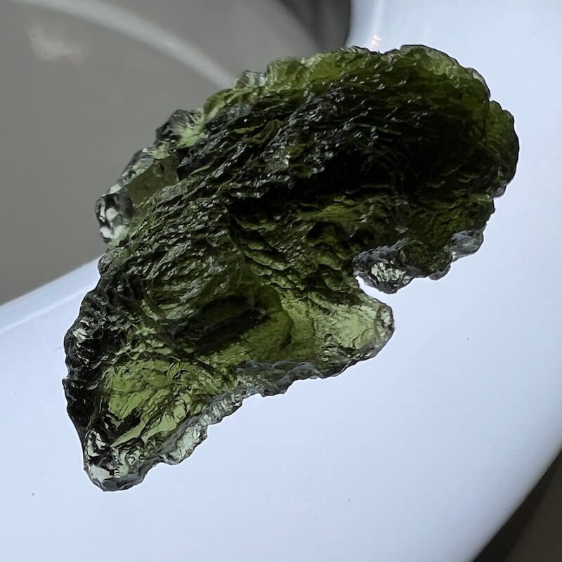 RARE Authentic Moldavite - Meteorite - Healing Crystal - Moldavite available. Looking for an genuine moldavite? Find Moldavite Meteorite tektite when you shop at Magic Crystals. 5 Grams of Authentic Moldavite stone from Czech Republic - Tektite Crystal, 'A' Grade at Magiccrystals.com. Moldavite-5-grams-A4