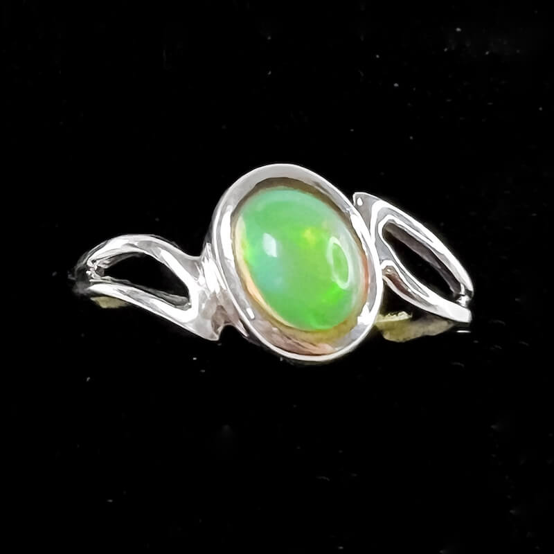 Find the best selection of opal ring here at MagicCrystals.com. Ethiopian Real Opal - 925 Solid Silver Ring - Opal Ring stabilizes mood swings and helps in overcoming fatigue. Our Opal Stone ring - Rough Opal Gemstone 925 Solid Silver, Gift ring, Handmade Birthstone ring. Magic Crystals offers free shipping