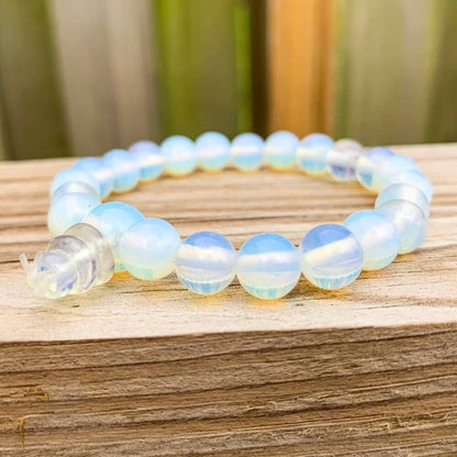 Find the best selection of Opalite Stone Mala Bracelet - Natural Bead Opal Gemstone Bracelet at Magic Crystals. Opalite meaning stabilizes mood swings and helps in overcoming fatigue. Opalite bracelet, opalite crystal bracelet. 7-8 inch bracelets crystals opalite. Opal stone bracelet. Opalite Jewelry with FREE SHIPPING