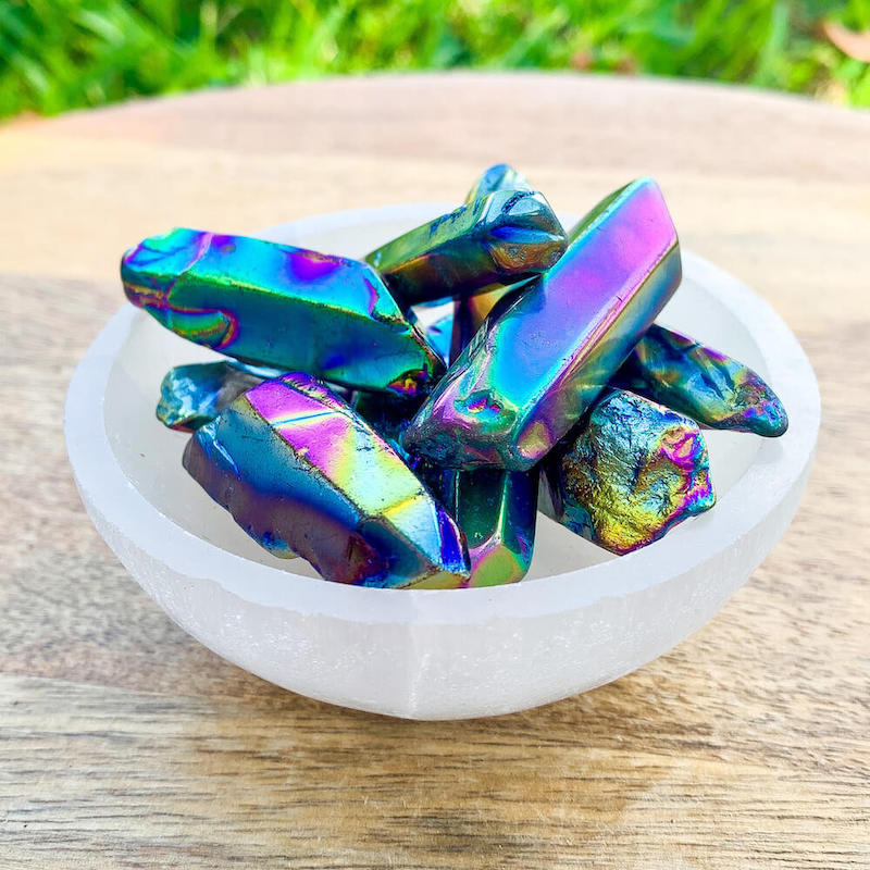 Looking for Rainbow Aura Quartz Crystal Polished Point Wand ? shop at Magic Crystals for double-terminated aura quartz polished wands. Raw crystal Aura, Quartz Point, Titanium Aura Quartz Crystal, Great quality Titanium, Rainbow Aura , Crystal Aura, healing crystals and stones.