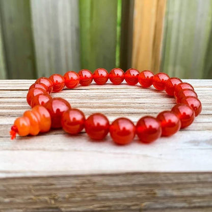 Looking for Red Agate Mala Beads Bracelet? Shop for Red Agate Jewelry at Magic Crystals. Grade A++ Red Agate Crystal Bead Bracelet 8mm, Genuine Red Agate Gemstone Bracelet, Protection Relieves Stress Anxiety Gift for Men & Women. 8mm Gemstone Dyed Beaded Stretch. FREE SHIPPING available.