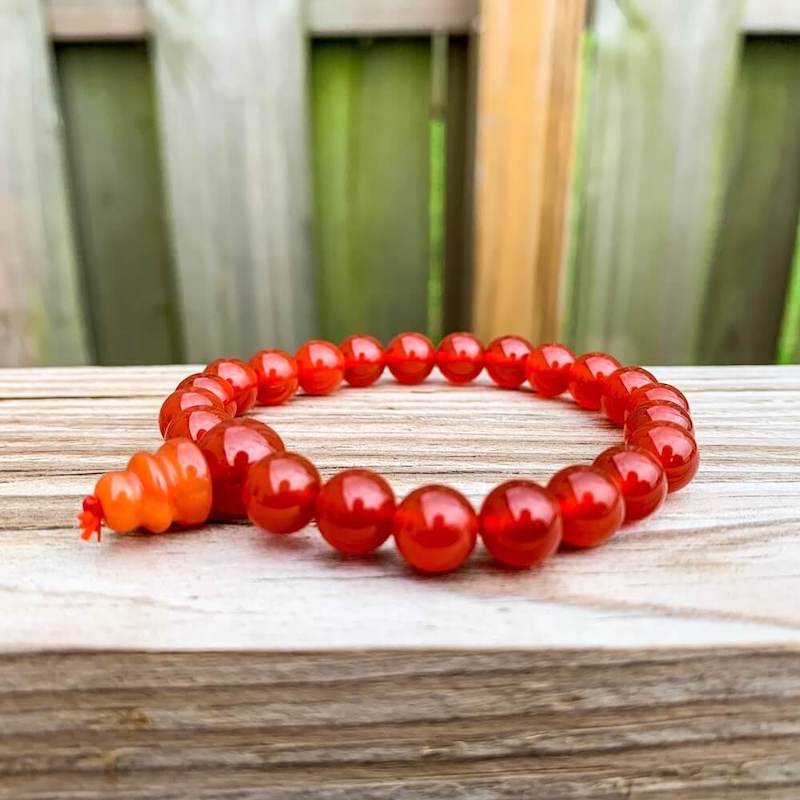 Looking for Red Agate Mala Beads Bracelet? Shop for Red Agate Jewelry at Magic Crystals. Grade A++ Red Agate Crystal Bead Bracelet 8mm, Genuine Red Agate Gemstone Bracelet, Protection Relieves Stress Anxiety Gift for Men & Women. 8mm Gemstone Dyed Beaded Stretch. FREE SHIPPING available.