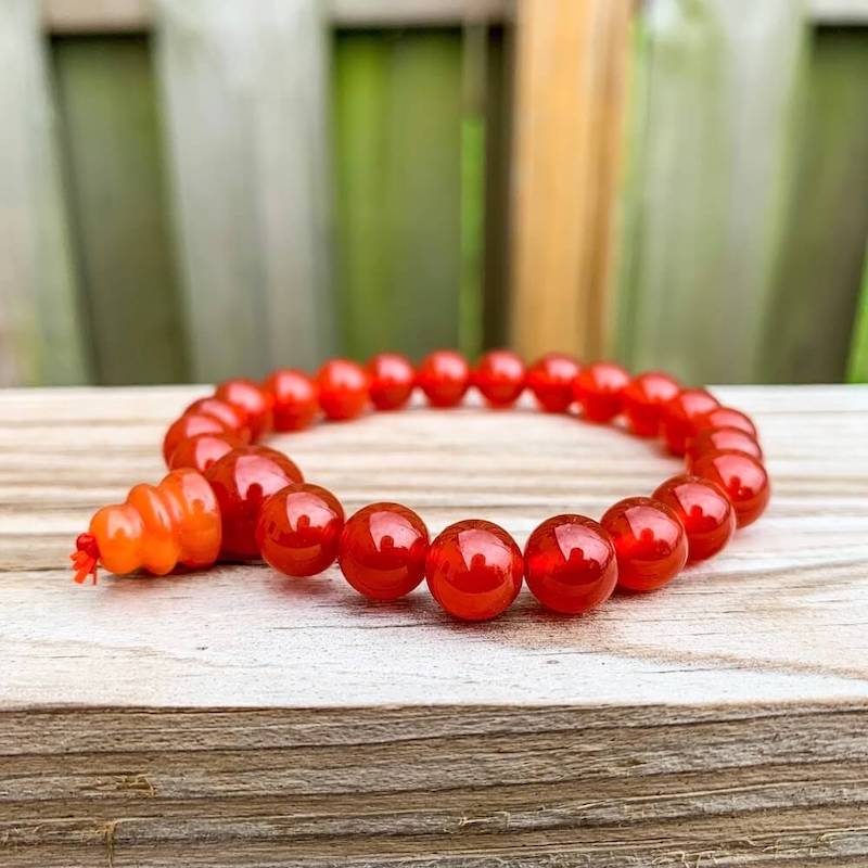Looking for Red Agate Mala Beads Bracelet? Shop for Red Agate Jewelry at Magic Crystals. Grade A++ Red Agate Crystal Bead Bracelet 8mm, Genuine Red Agate Gemstone Bracelet, Protection Relieves Stress Anxiety Gift for Men & Women. 8mm Gemstone Dyed Beaded Stretch. FREE SHIPPING available.