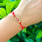    Red-Evil-Eye-Red-String-Bracelet. Shop at Magic Crystals for Protection. The Red String Bracelet has been worn throughout history in many cultures as a symbol of protection, faith, and good luck and acts as a shield from negativity and actually has many positive effects. In quite a few cultures a red string bracelet is believed to have magical powers.