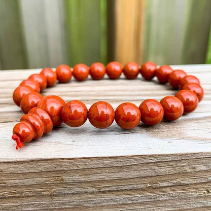 Looking for Red Jasper Mala Beaded Bracelet - Red Jasper Jewelry? Shop at Magic Crystals for Natural Red Jasper Unisex Elastic Bracelet. Red jasper is a stone of physical strength, a vitality that can help with the stabilization of one’s energy. FREE SHIPPING available. Natural Healing Gemstone Bracelet.