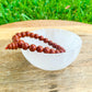 Looking for Red Jasper Mala Beaded Bracelet - Red Jasper Jewelry? Shop at Magic Crystals for Natural Red Jasper Unisex Elastic Bracelet. Red jasper is a stone of physical strength, a vitality that can help with the stabilization of one’s energy. FREE SHIPPING available. Natural Healing Gemstone Bracelet.