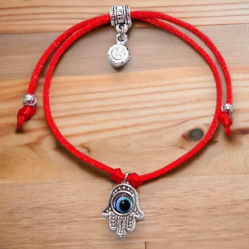 Hamsa-Red-String-Bracelet. Shop at Magic Crystals for Protection. The Red String Bracelet has been worn throughout history in many cultures as a symbol of protection, faith, and good luck and acts as a shield from negativity and actually has many positive effects. In quite a few cultures a red string bracelet is believed to have magical powers.