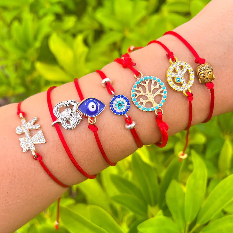 Shop at Magic Crystals for Protection. The Red String Bracelet has been worn throughout history in many cultures as a symbol of protection, faith, and good luck and acts as a shield from negativity and actually has many positive effects. In quite a few cultures a red string bracelet is believed to have magical powers.