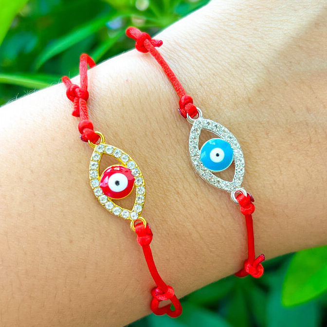 Evil-Eye-Bracelet.Shop at Magic Crystals for Protection. The Red String Bracelet has been worn throughout history in many cultures as a symbol of protection, faith, and good luck and acts as a shield from negativity and actually has many positive effects. In quite a few cultures a red string bracelet is believed to have magical powers.