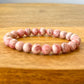 8 mm-Rhodochrosite-Stone-Gemstone Beaded Bracelet - MagicCrystals.Check out our Gemstone Beaded Bracelet made of polished stone - 8mm Crystal Stone bracelet. This are the very Best and Unique Handmade items from MagicCrystals.com Crystal Bracelet, Gemstone bracelet, Minimalist Crystal Jewelry, Trendy Summer Jewelry, Gift for him and her.
