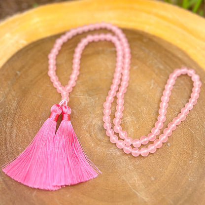 Shop beautiful hand crafted Natural Gemstone Mala Necklace - Prayer Beads at Magic Crystals. High quality Prayer Beads, Including Lapis Lazuli, Larvikite, Snowflake Obsidian, Howlite, Black Agate, Picture Jasper, Red Jasper, and Amethyst. Handcrafted with 108 beads, can be worn as a necklace or bracelet.